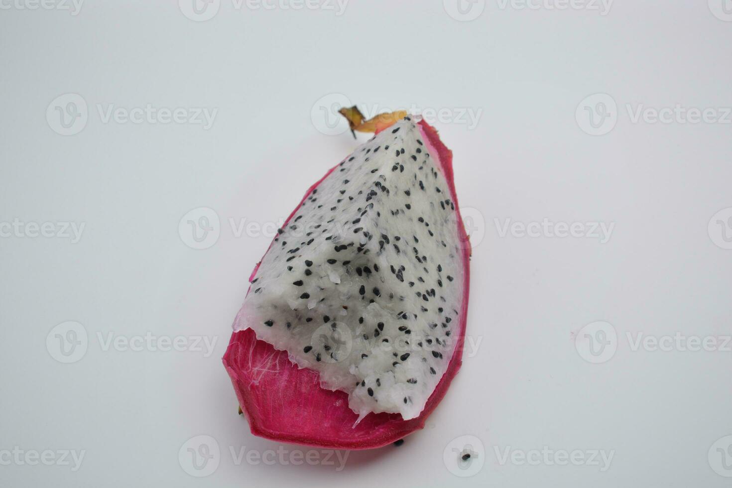 Dragon fruit, a fruit with many seeds, on a white background photo