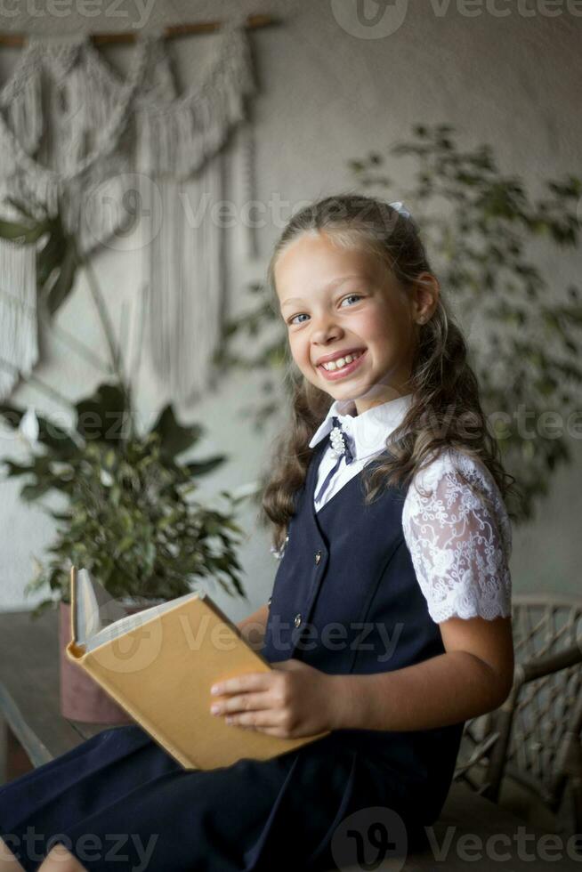 Primary school girl, in school uniform photo