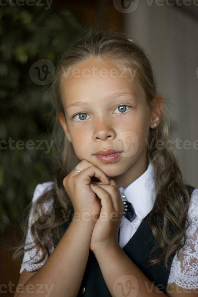 Primary school girl, in school uniform photo