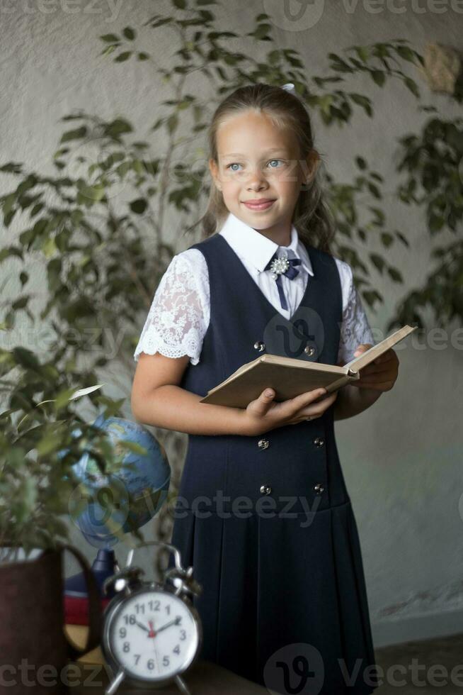 Primary school girl, in school uniform photo