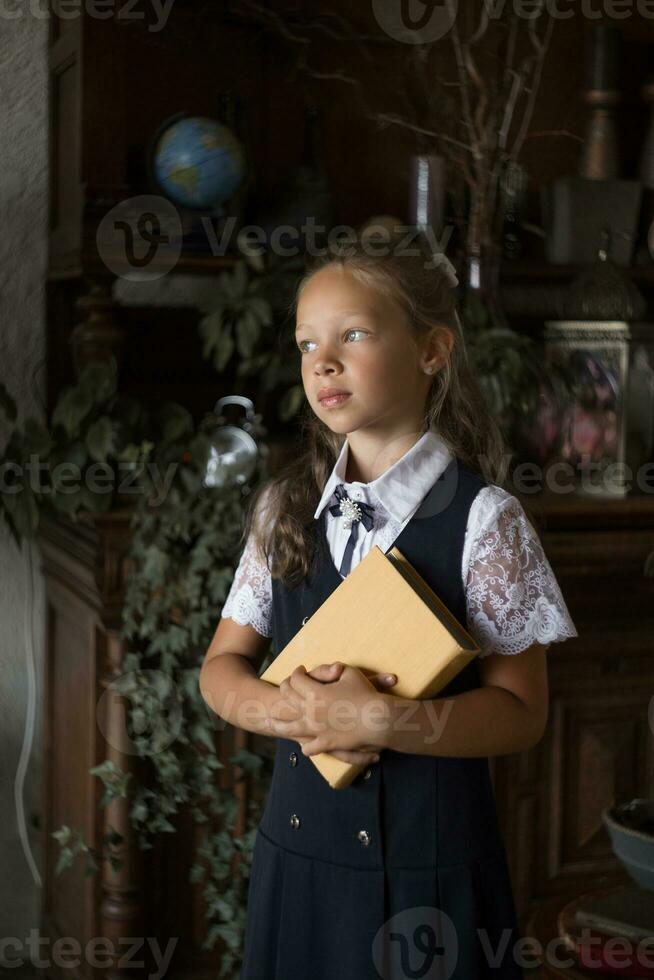 Primary school girl, in school uniform photo