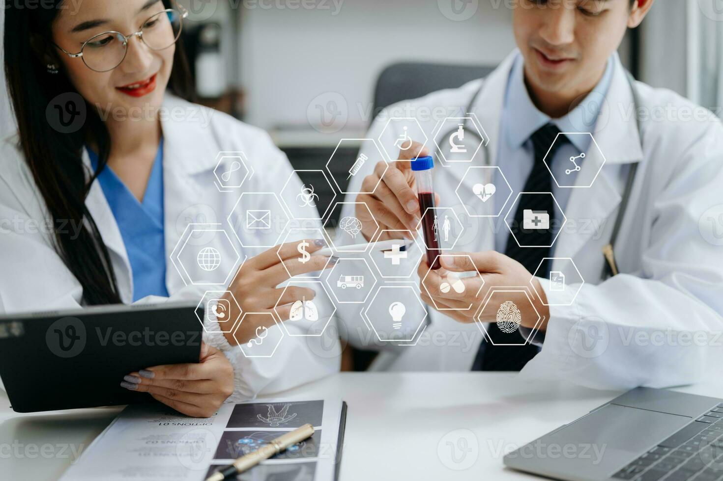 Medical technology network team meeting concept. Doctor hand working with smart phone modern digital tablet and laptop computer with graphics chart interface, with virtual icon diagram photo
