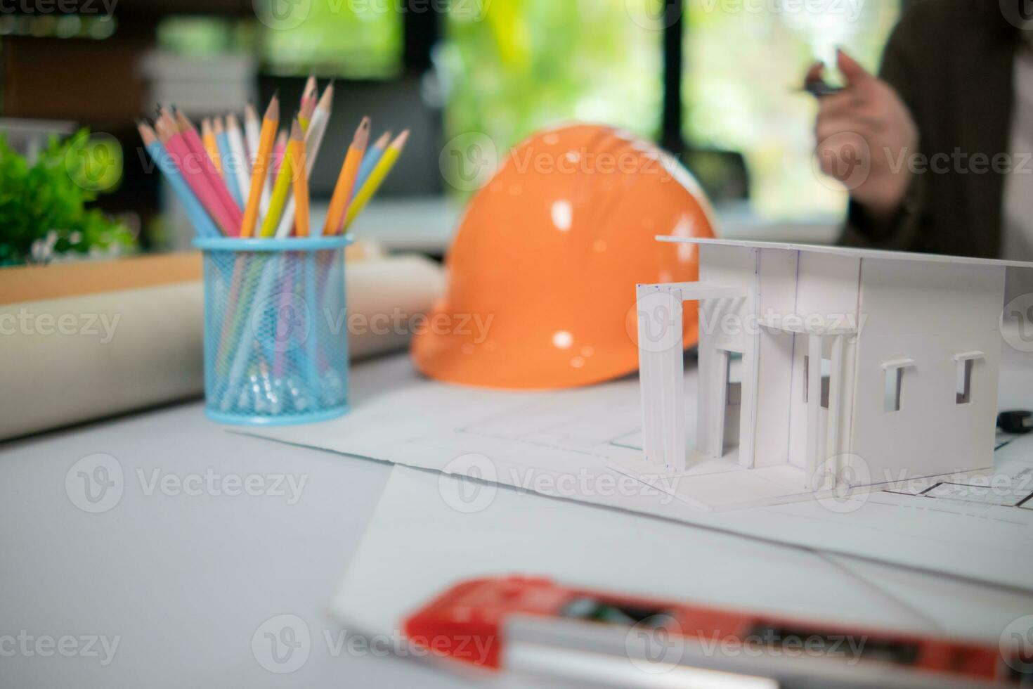 Equipment and drawings lying on desks inside the offices of architects and engineers. background of an architect's workbench getting ready for work to achieve the desired outcome of the client. photo