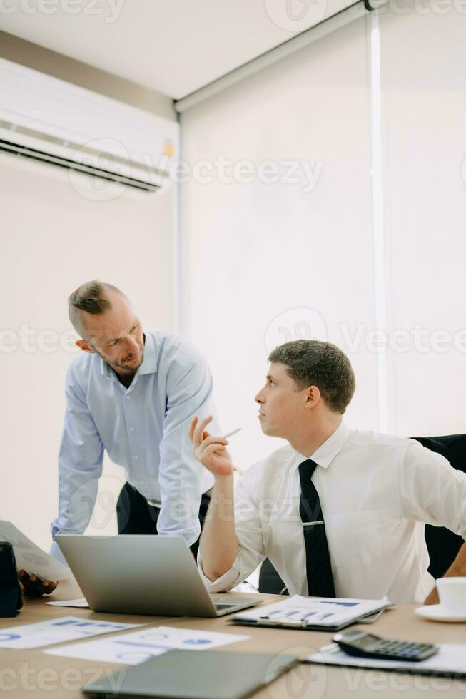 Creative managers crew working with new startup project in modern office. Team brainstorming. photo