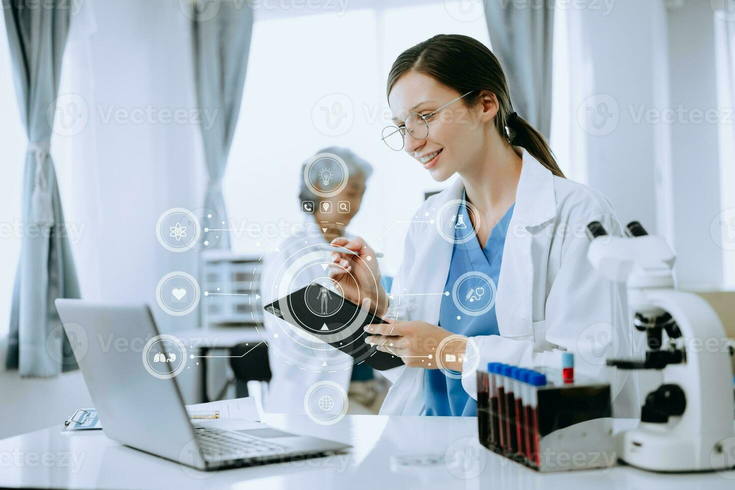 medical technology concept,smart woman doctor hand working with modern laptop computer with his team virtual icon diagram photo