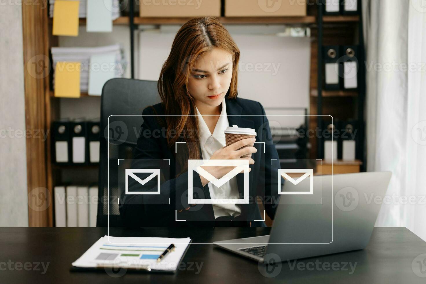 Woman hands using Laptop, tablet typing on keyboard and surfing the internet with email icon, email marketing concept, send e-mail or newsletter, online working internet network technology. photo