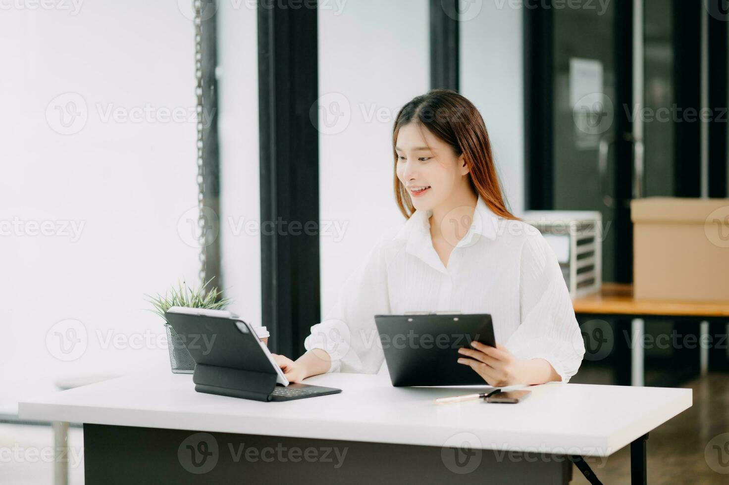 Project manager working and update tasks with milestones progress planning and Gantt chart scheduling diagram. business working with smart phone, tablet and laptop in office. photo