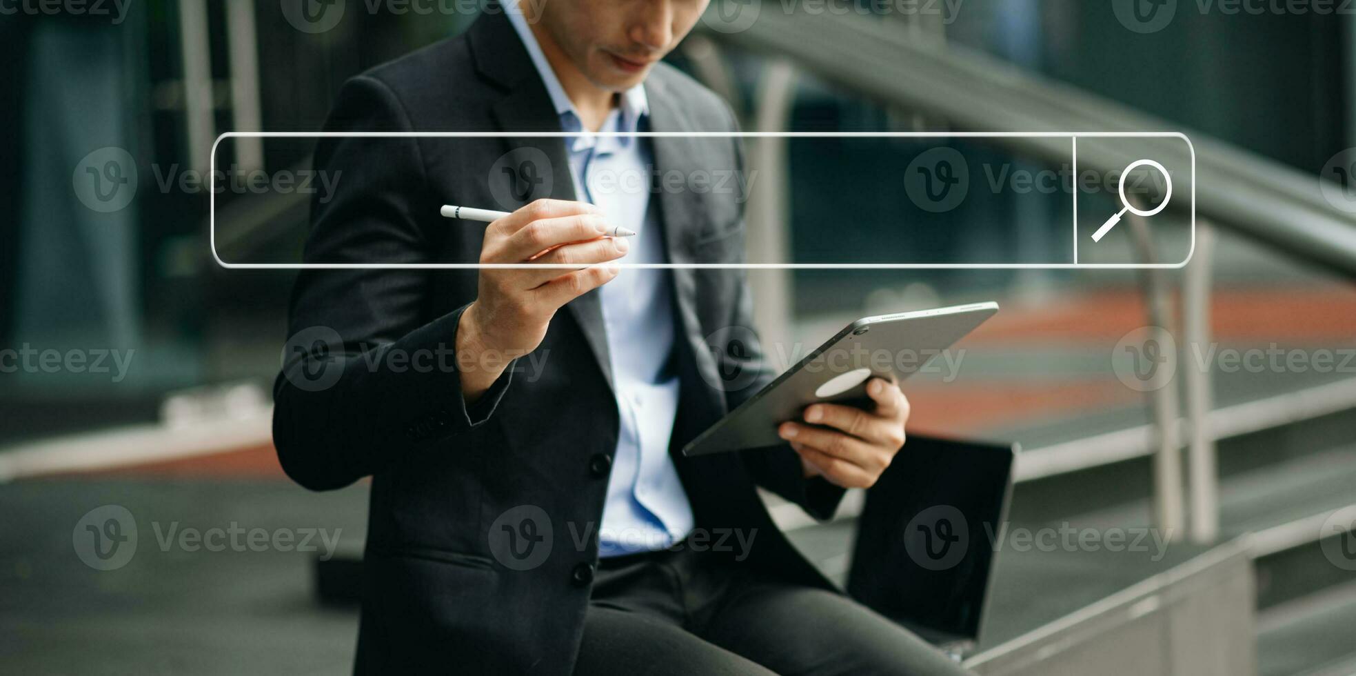 Searching Browsing Internet Data Information Networking Concept with blank search bar.man working with mobile phone and laptop computer VR icon in office photo