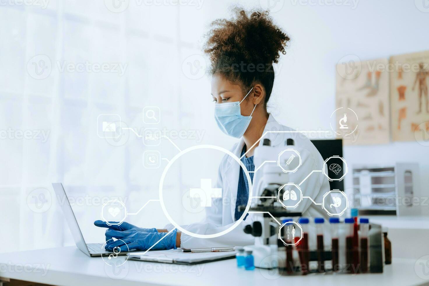 African Dctor work on digital tablet healthcare doctor technology tablet using computer  in laboratory study with virtual icon photo
