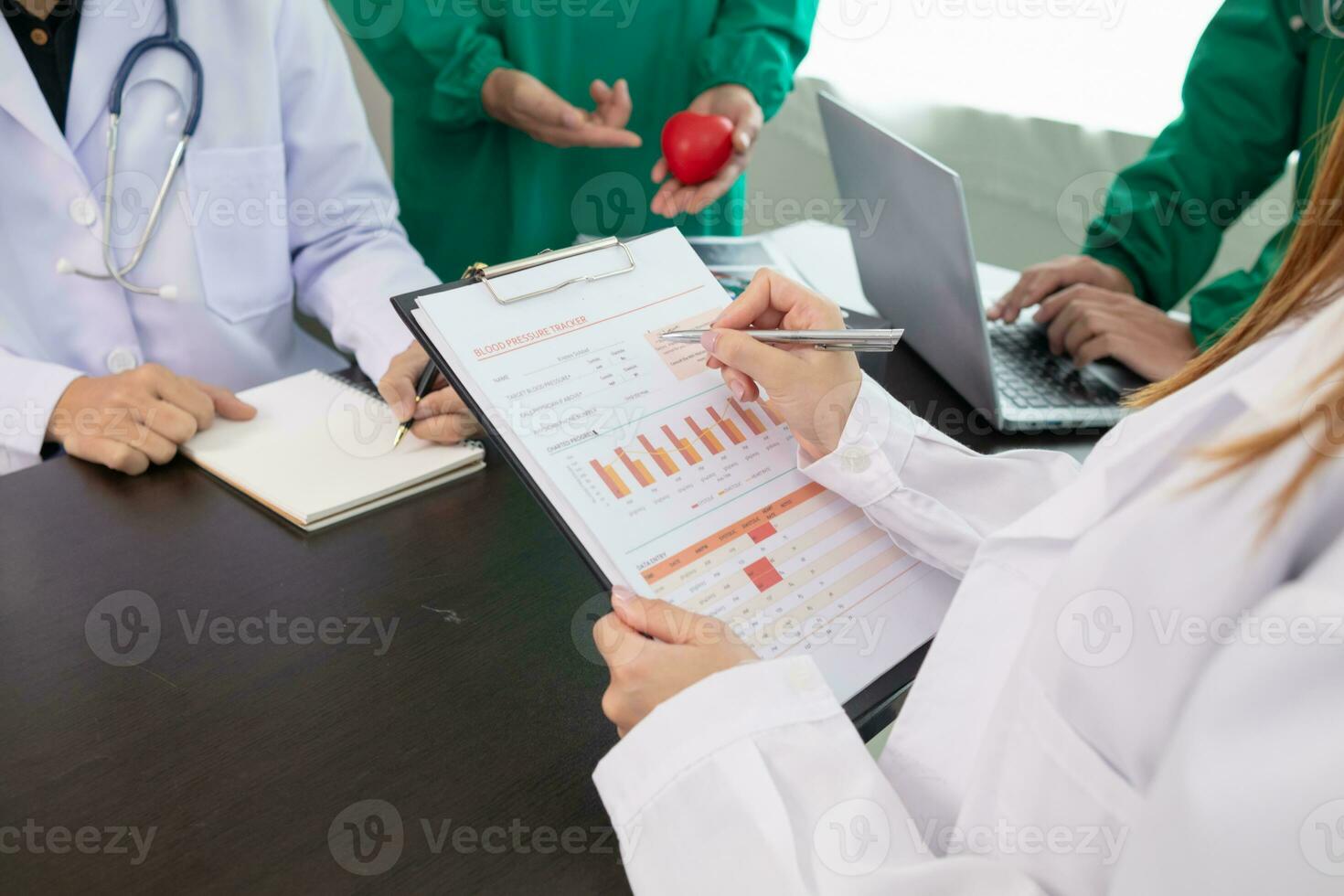 The doctor joins a meeting with the surgeon's team to discuss a plan for cancer surgery after the medical team detects cancer. Collaborative concept of a team doctors and surgeons in surgery. photo