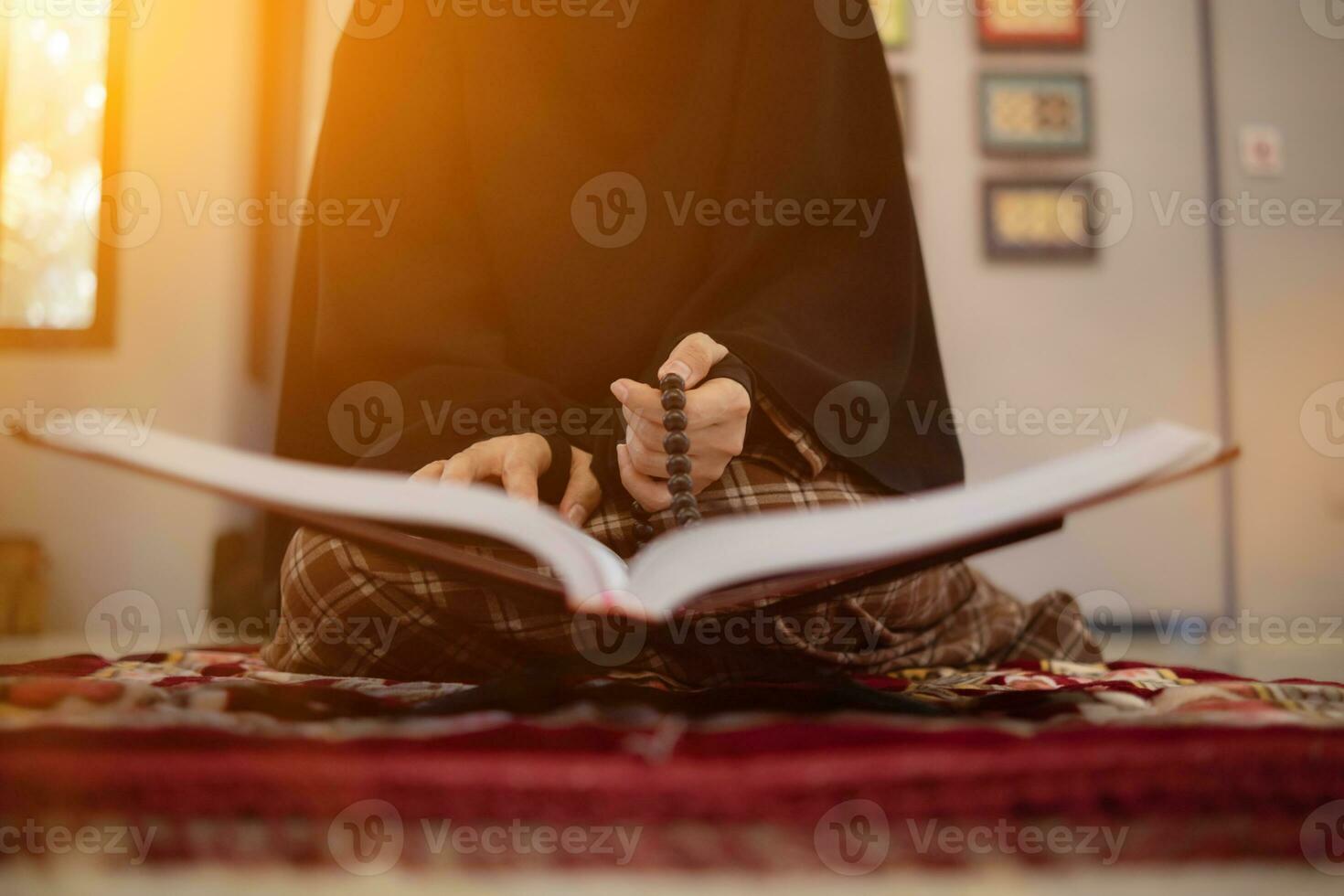 muslim women in hijab are praying to show respect and thanks to allah according to muslim belief and muslim women in hijab are praying to allah according to traditional belief from quran photo