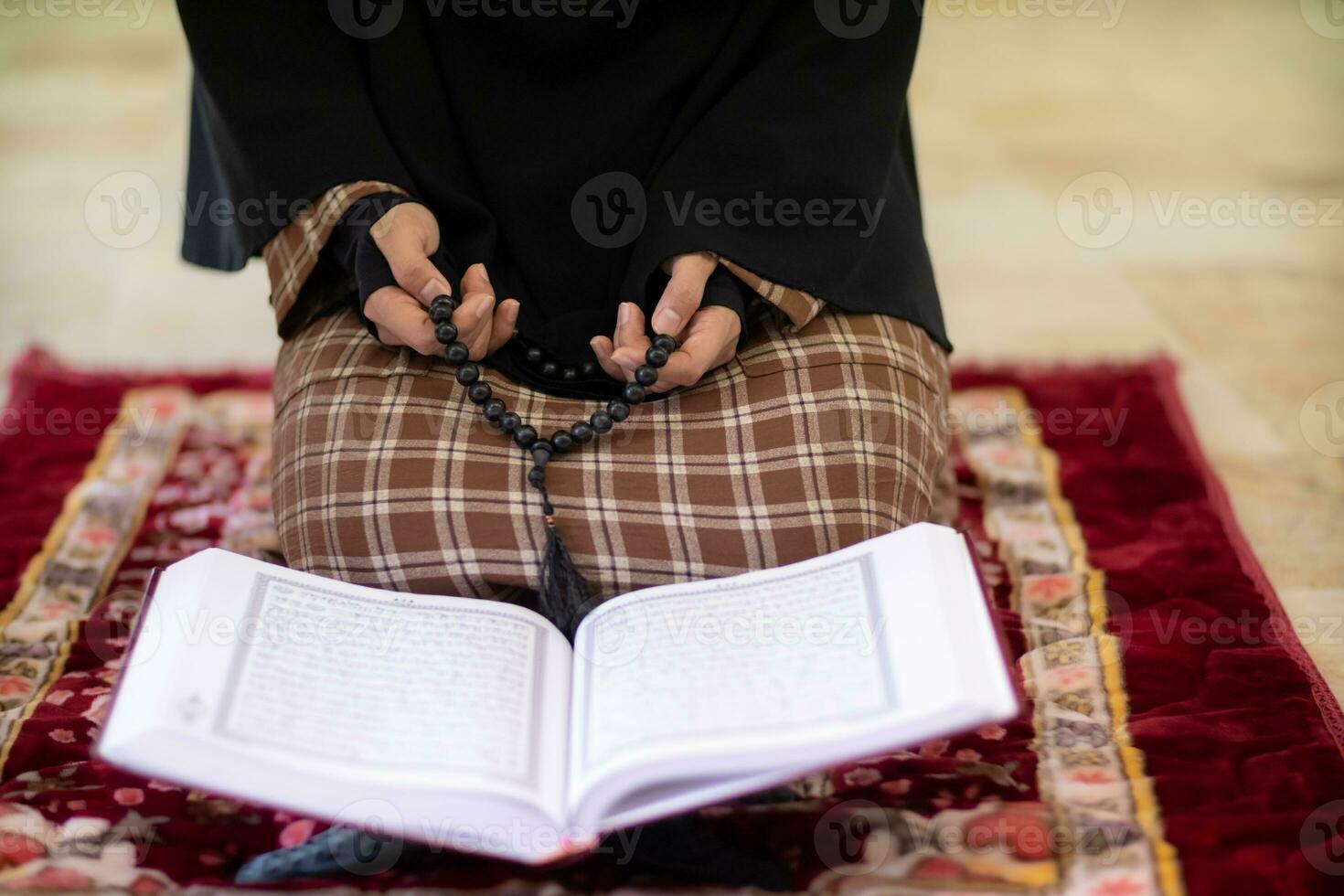 muslim women in hijab are praying to show respect and thanks to allah according to muslim belief and muslim women in hijab are praying to allah according to traditional belief from quran photo