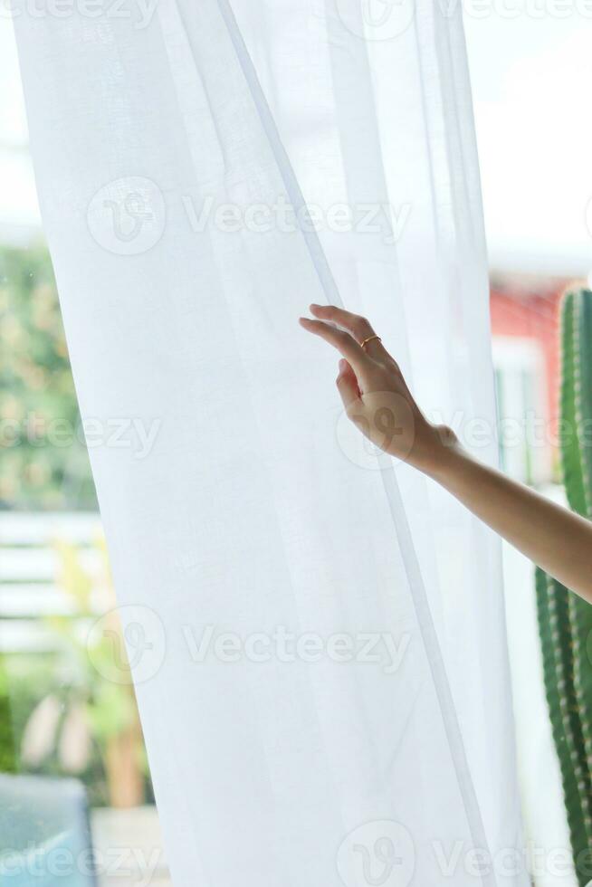 woman wearing see through nightgown stands alone lonely and depressed due to her depression and having to take medication to reduce stress when alone. woman who is depressed because of being alone photo