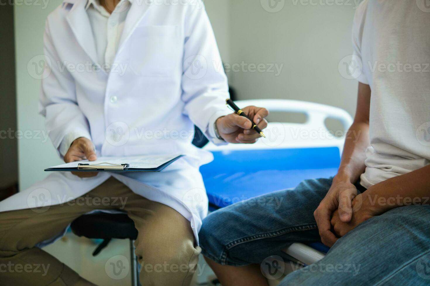 doctor is having consultation discussing prostate cancer and venereal cancer detected in young man. Current doctors provide advice and counseling on detecting prostate cancer and treating it properly. photo