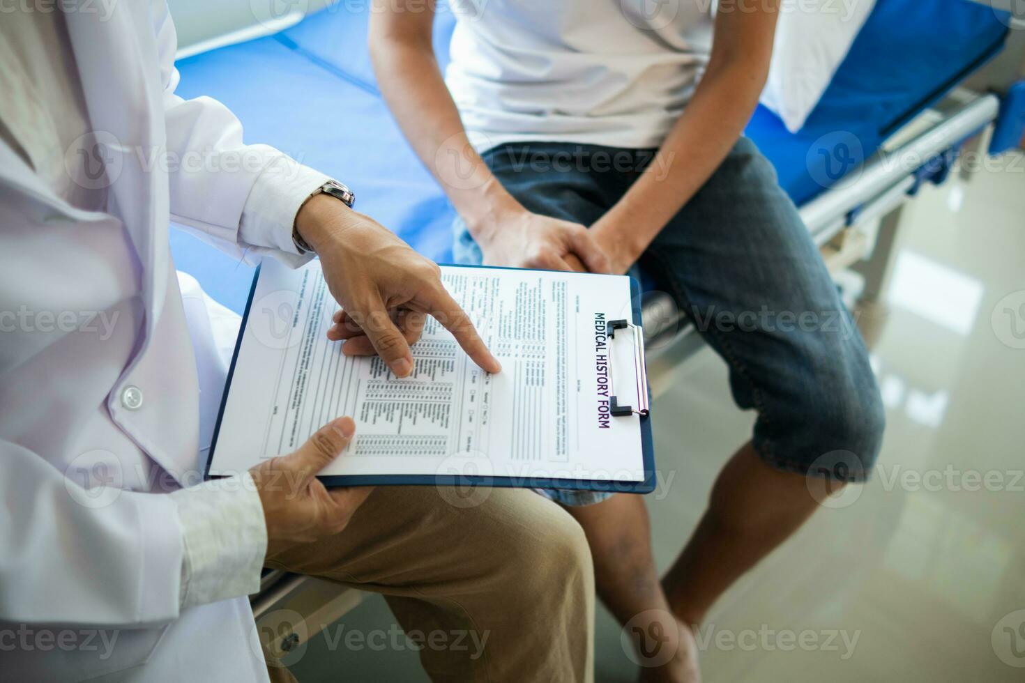 doctor is having consultation discussing prostate cancer and venereal cancer detected in young man. Current doctors provide advice and counseling on detecting prostate cancer and treating it properly. photo