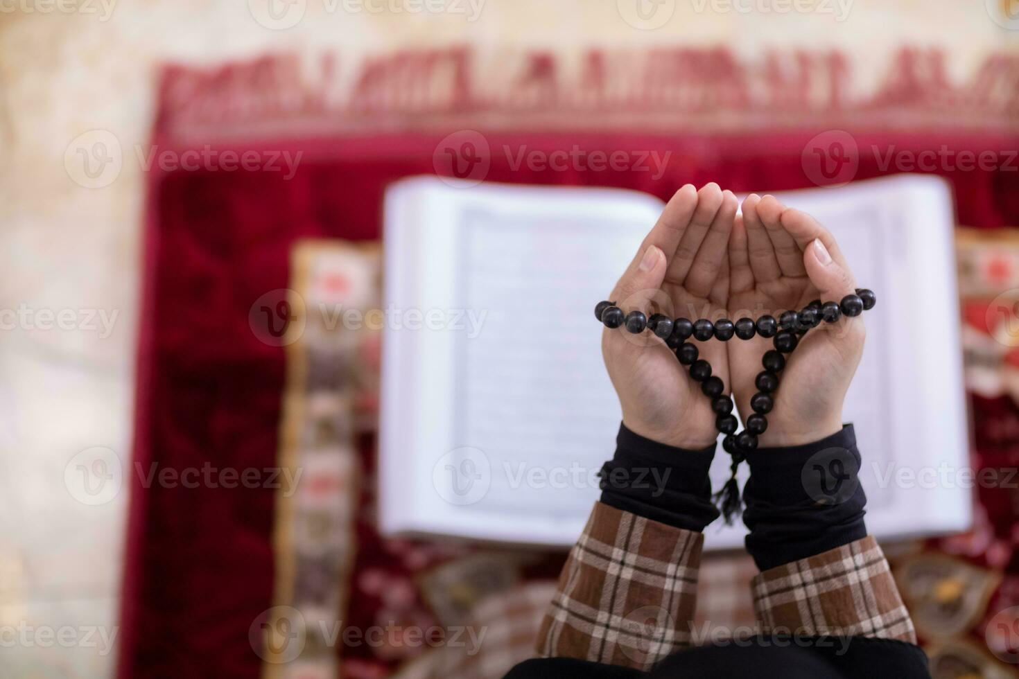 muslim women in hijab are praying to show respect and thanks to allah according to muslim belief and muslim women in hijab are praying to allah according to traditional belief from quran photo
