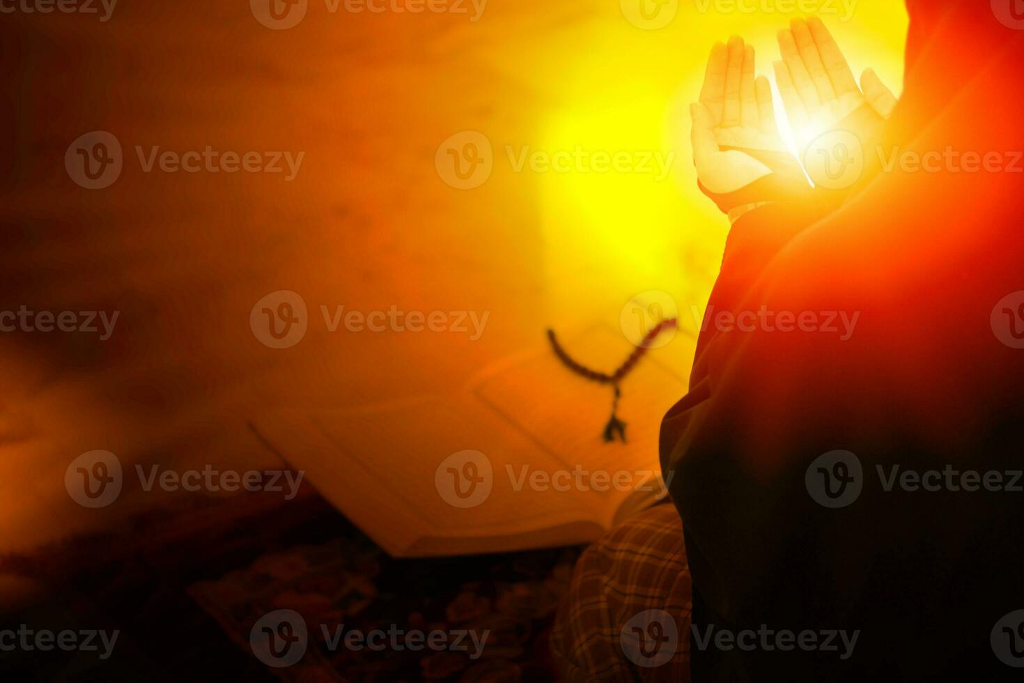 muslim women in hijab are praying to show respect and thanks to allah according to muslim belief and muslim women in hijab are praying to allah according to traditional belief from quran photo