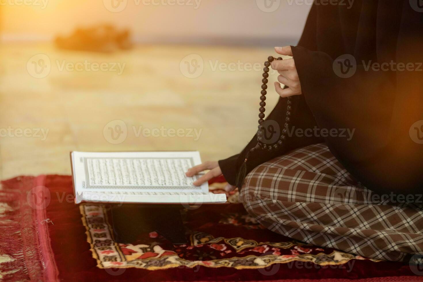 muslim women in hijab are praying to show respect and thanks to allah according to muslim belief and muslim women in hijab are praying to allah according to traditional belief from quran photo