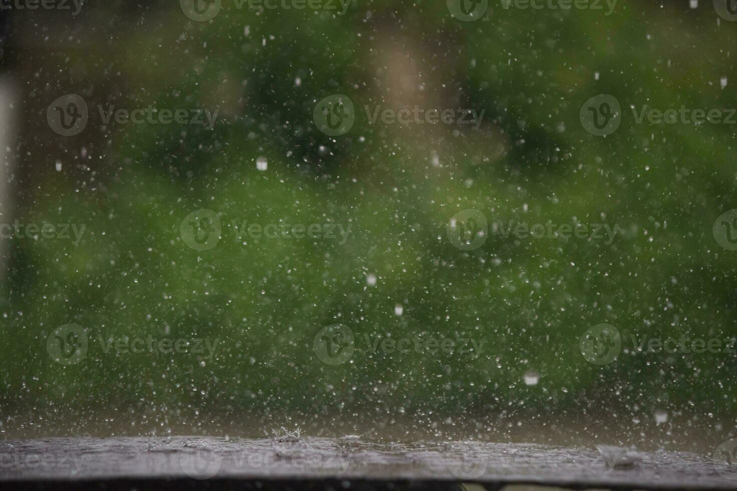 rain was falling on the roadway due to precipitation that was forming after depression hit Thailand causing heavy rain in some areas and flooding road surface. Behind the scenes of heavy rain photo