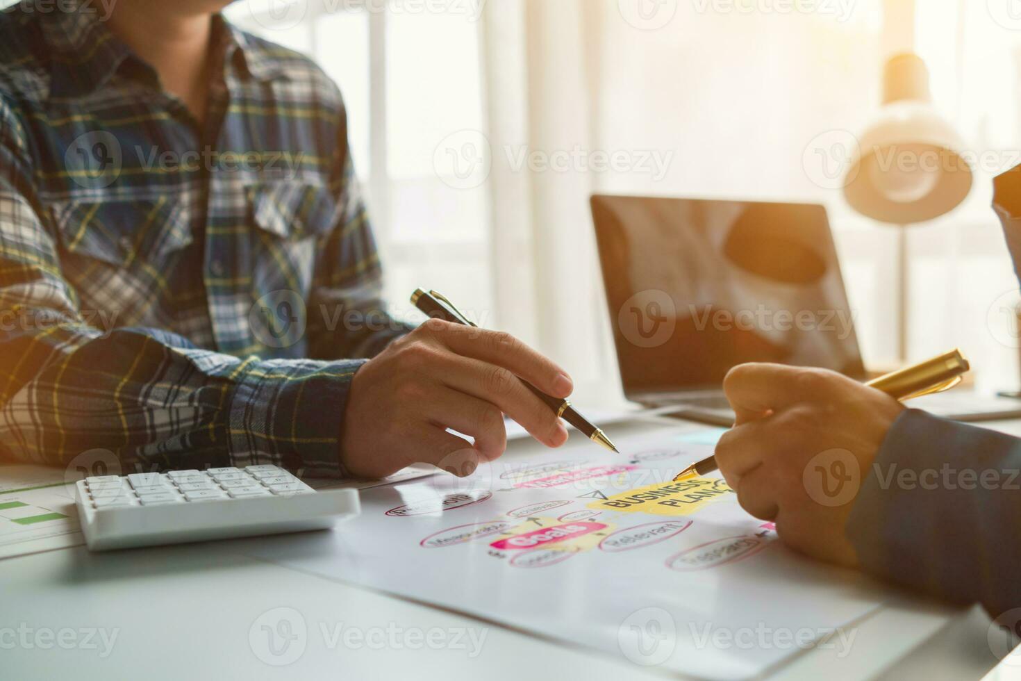 A group of investors and business teams are discussing investment trends for the best results. The concept of hiring an investment consultant to get highly efficient investment advice. photo