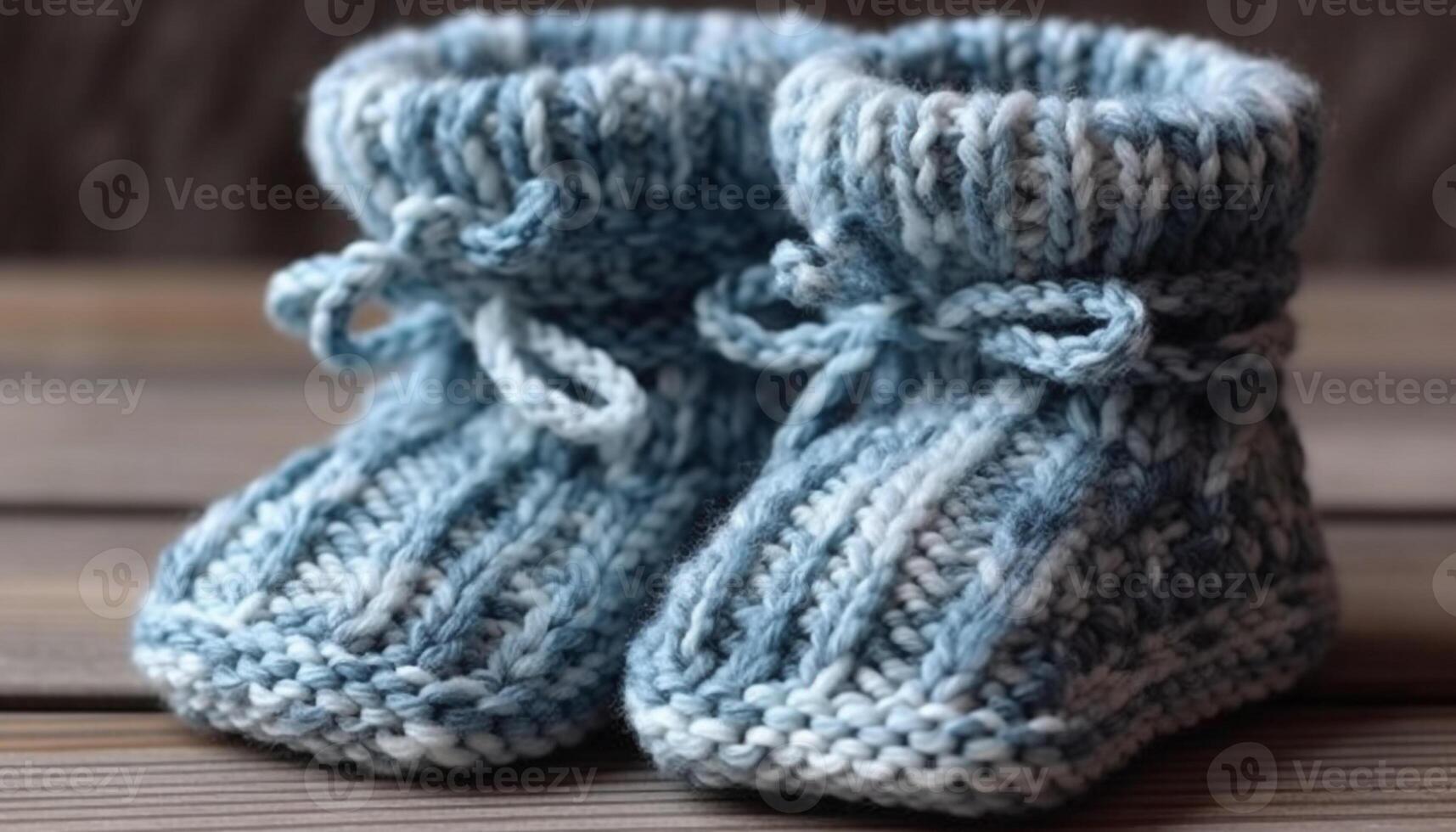 Blue knitted baby booties, a cozy and cute homemade craft generated by AI photo