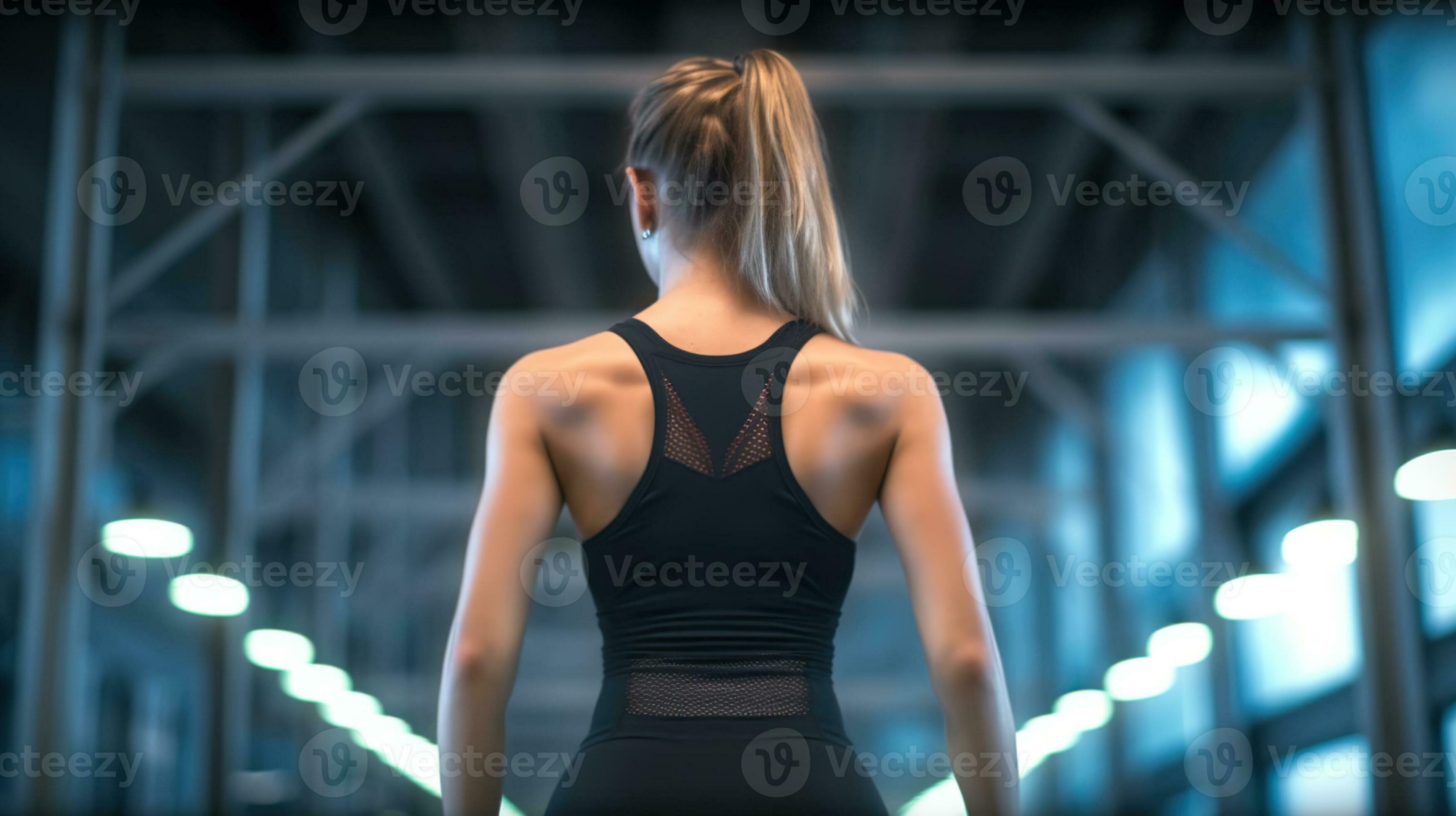 Black-Attired Fitness Enthusiast Strikes a Pose in the Gym. Generative AI  27744704 Stock Photo at Vecteezy