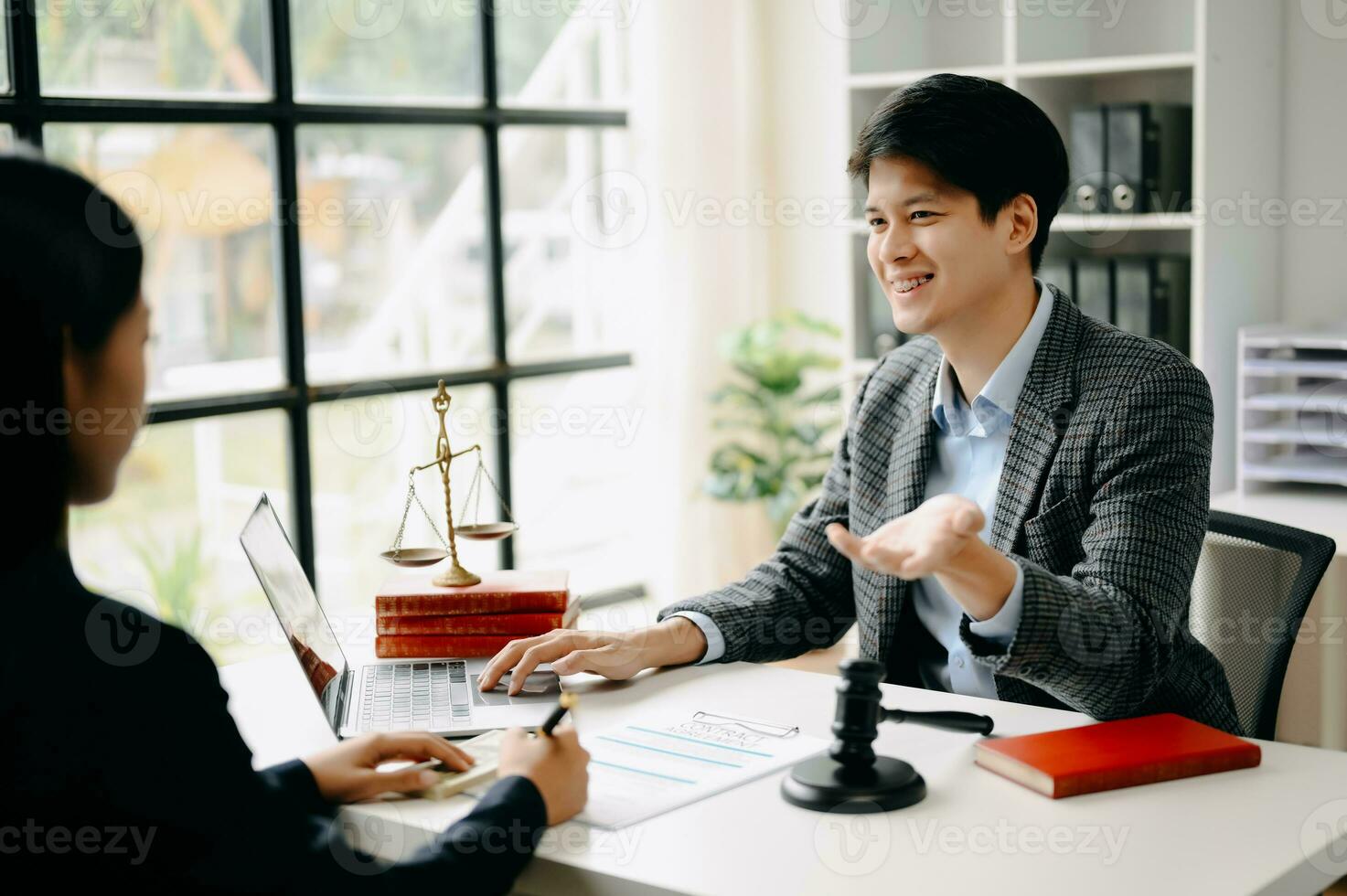 business people and lawyers discussing contract papers sitting at the table. Concepts of law, advice, legal services. in morning light photo