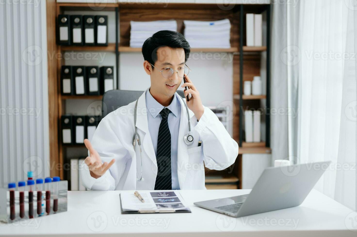 Man doctor phone call, healthcare talking and medical service writing sick note, surgery planning and prescription.and clinical report test results in office photo