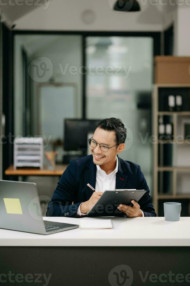 justice and law concept .Asian Male judge in a courtroom on table and Counselor working in modern office. photo