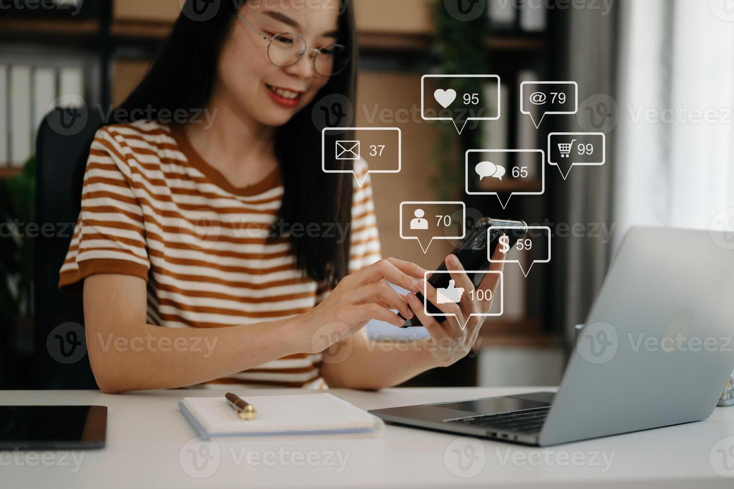 Social media and Marketing virtual icons screen concept. close up of businesswoman typing keyboard tablet with laptop computer  and smart phone in office photo