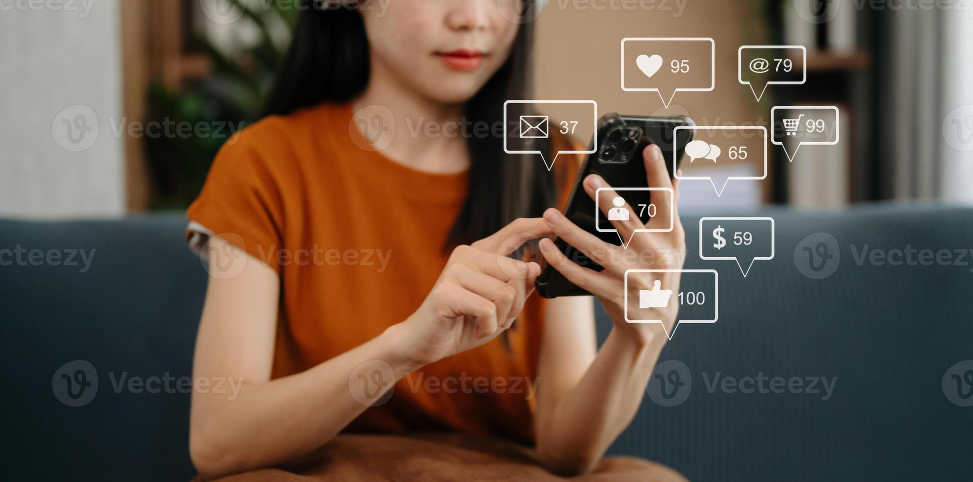 Social media and Marketing virtual icons screen concept. close up of businesswoman typing keyboard tablet with laptop computer  and smart phone in office photo