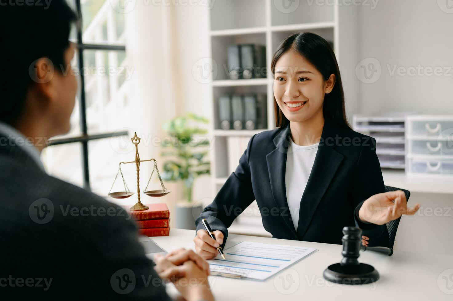 business people and lawyers discussing contract papers sitting at the table. Concepts of law, advice, legal services. in morning light photo