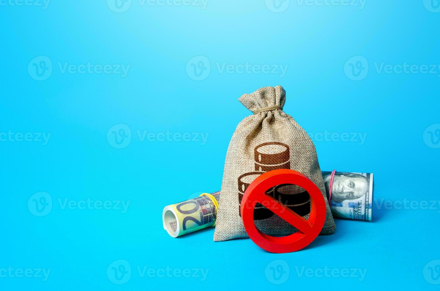 Money bag and prohibition sign NO. Sanctions and restrictions. Confiscation of capital of illegal origin. Freezing of assets, seizure of savings. Monitoring of suspicious transactions. photo
