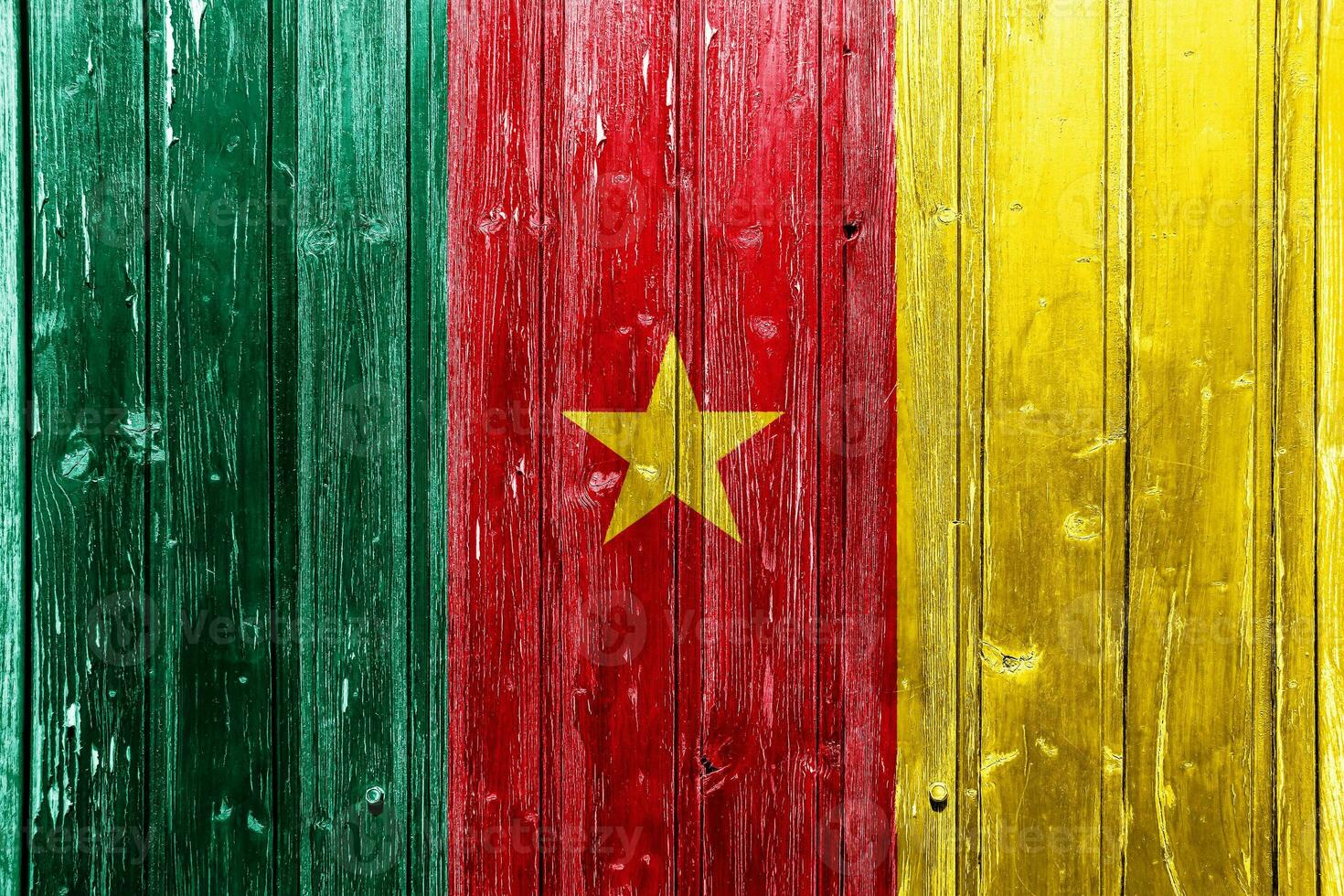 Flag of the Republic of Cameroon on a textured background. Concept collage. photo