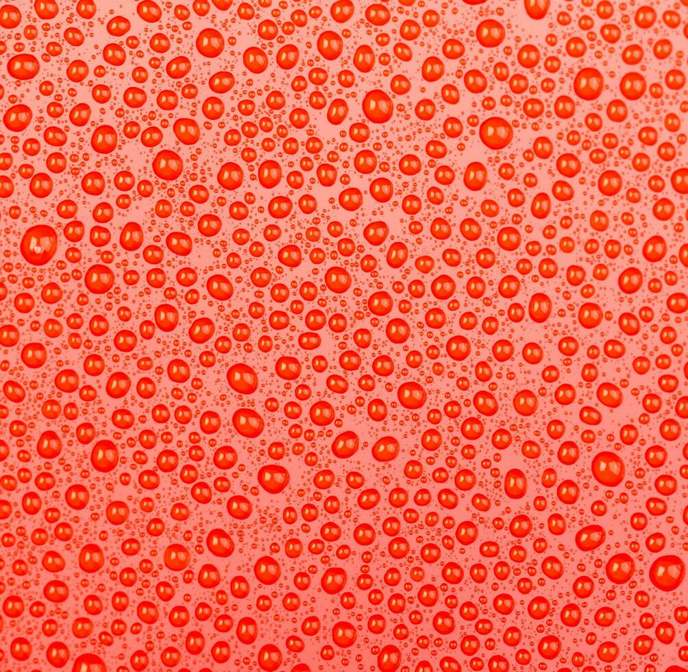 abstract water drop on red background photo