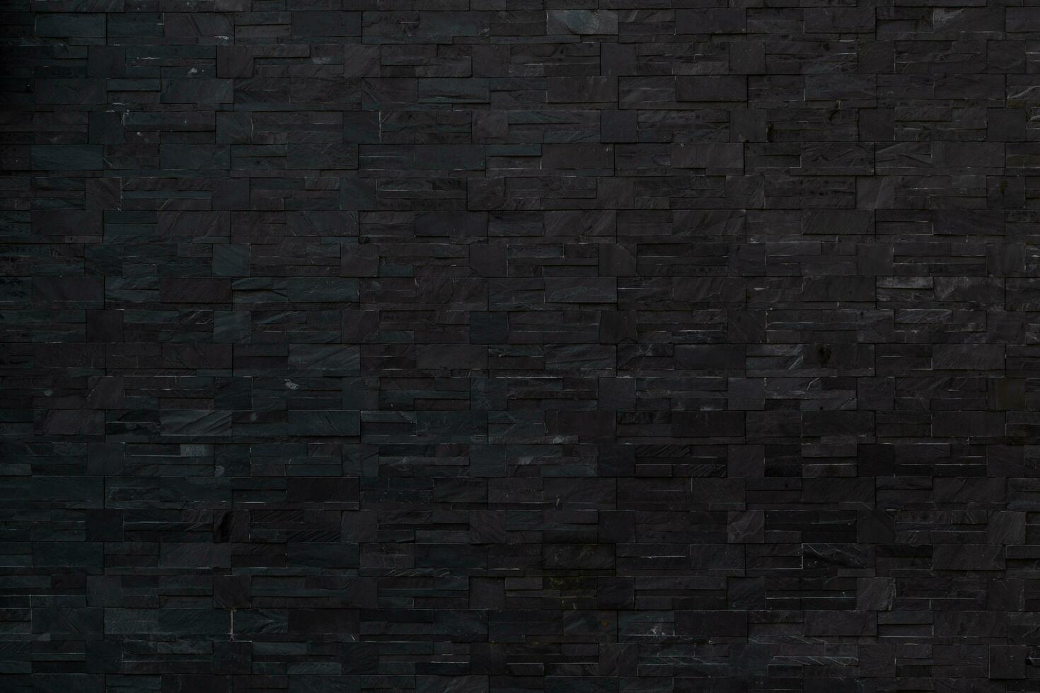 Dark Black brick wall texture for background. Brickwork background for Interior. photo