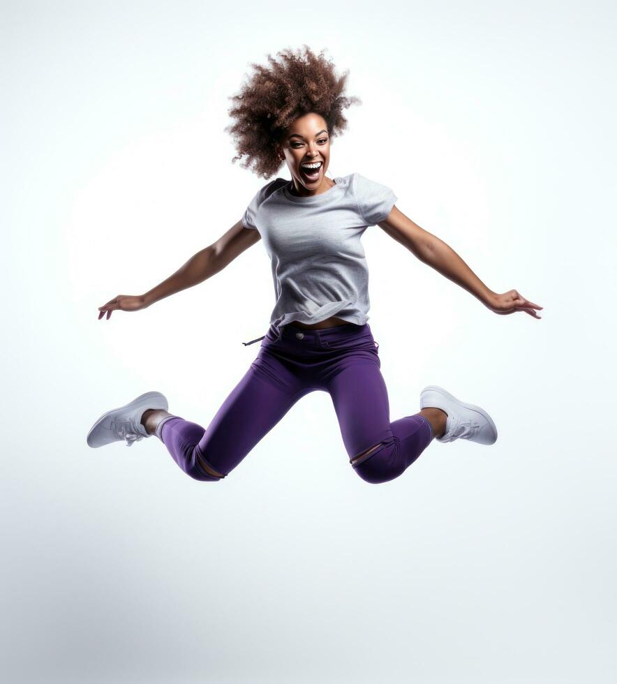 A female sports runner jumping isolated photo