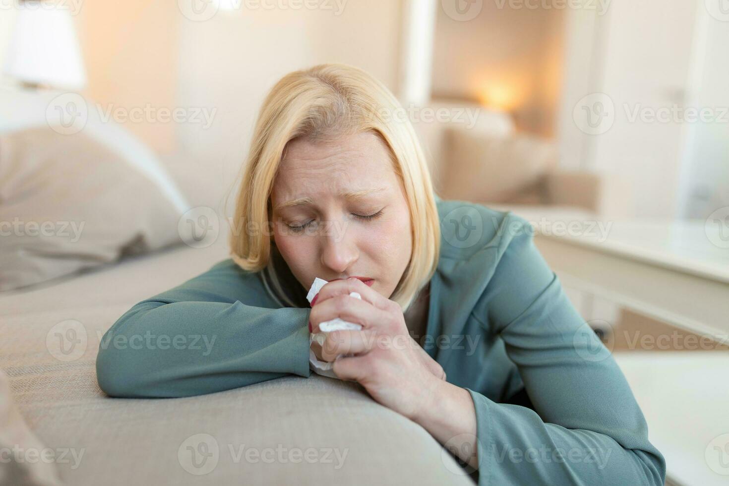 Close up young woman feeling upset, sad, unhappy or disappoint crying lonely at home. Emotional shock and life problems photo