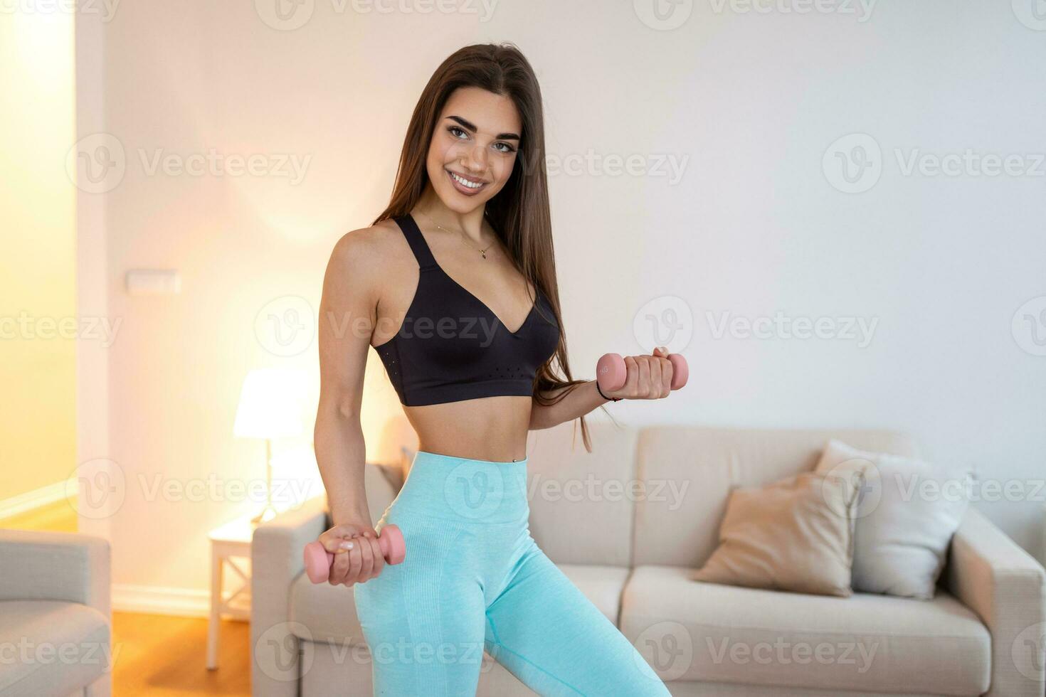 Athletic woman doing exercise for arms. Fitness model working out with  dumbbells. Woman exercising with dumbbells. Fitness, workout, healthy  living and diet concept. woman doing gymnastic exercises. 16345721 Stock  Photo at Vecteezy