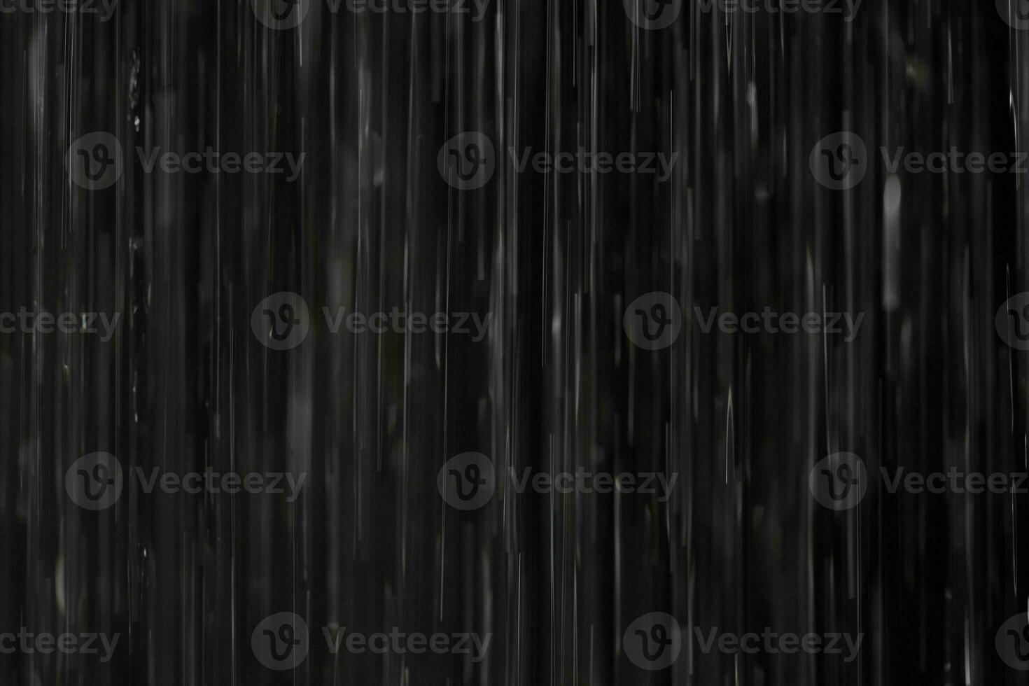 Rain on black. Abstract background. photo