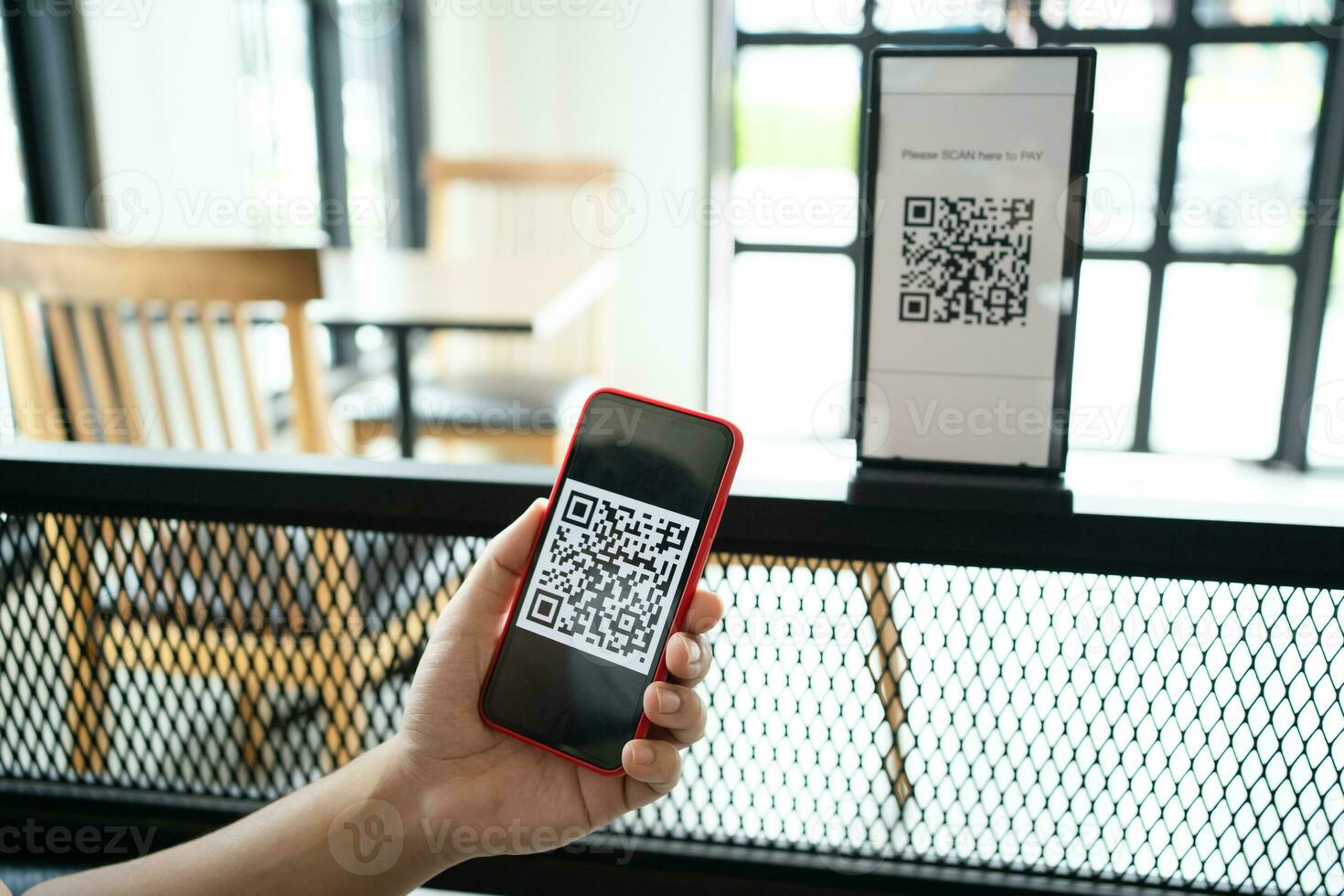 Qr code payment. E wallet. Man scanning tag accepted generate digital pay without money.scanning QR code online shopping cashless payment and verification technology concept photo