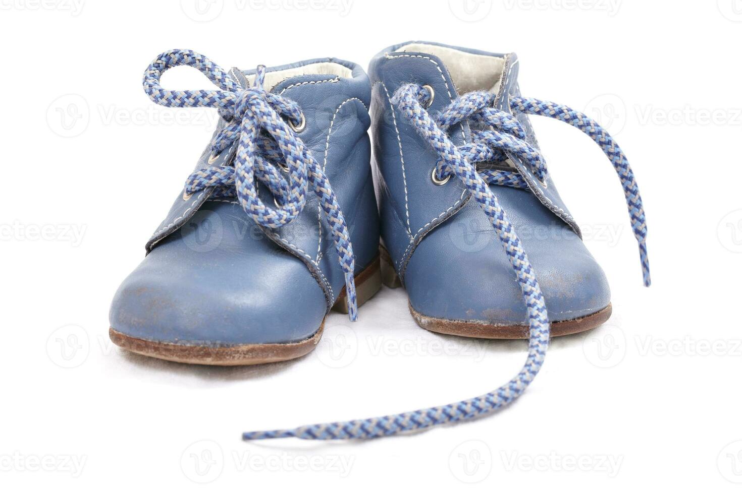 Old blue baby shoes photo