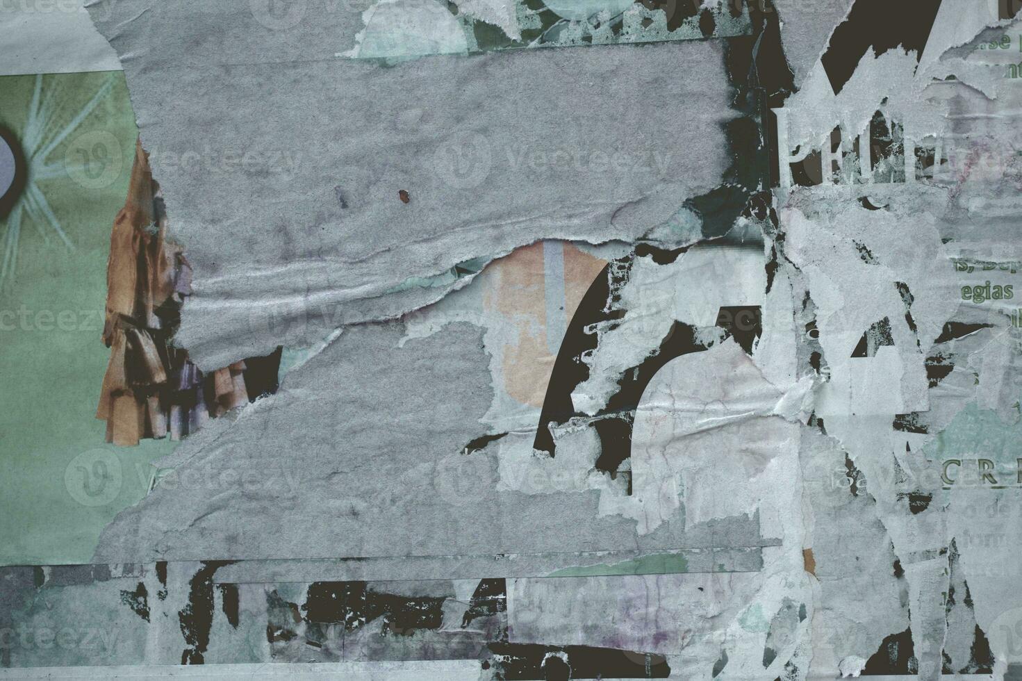 Background texture of remnants of paper on a wall photo