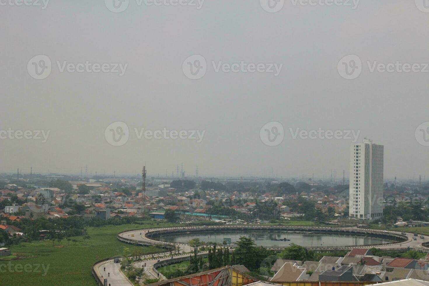 View of tall buildings, seen from the rooftop. photo