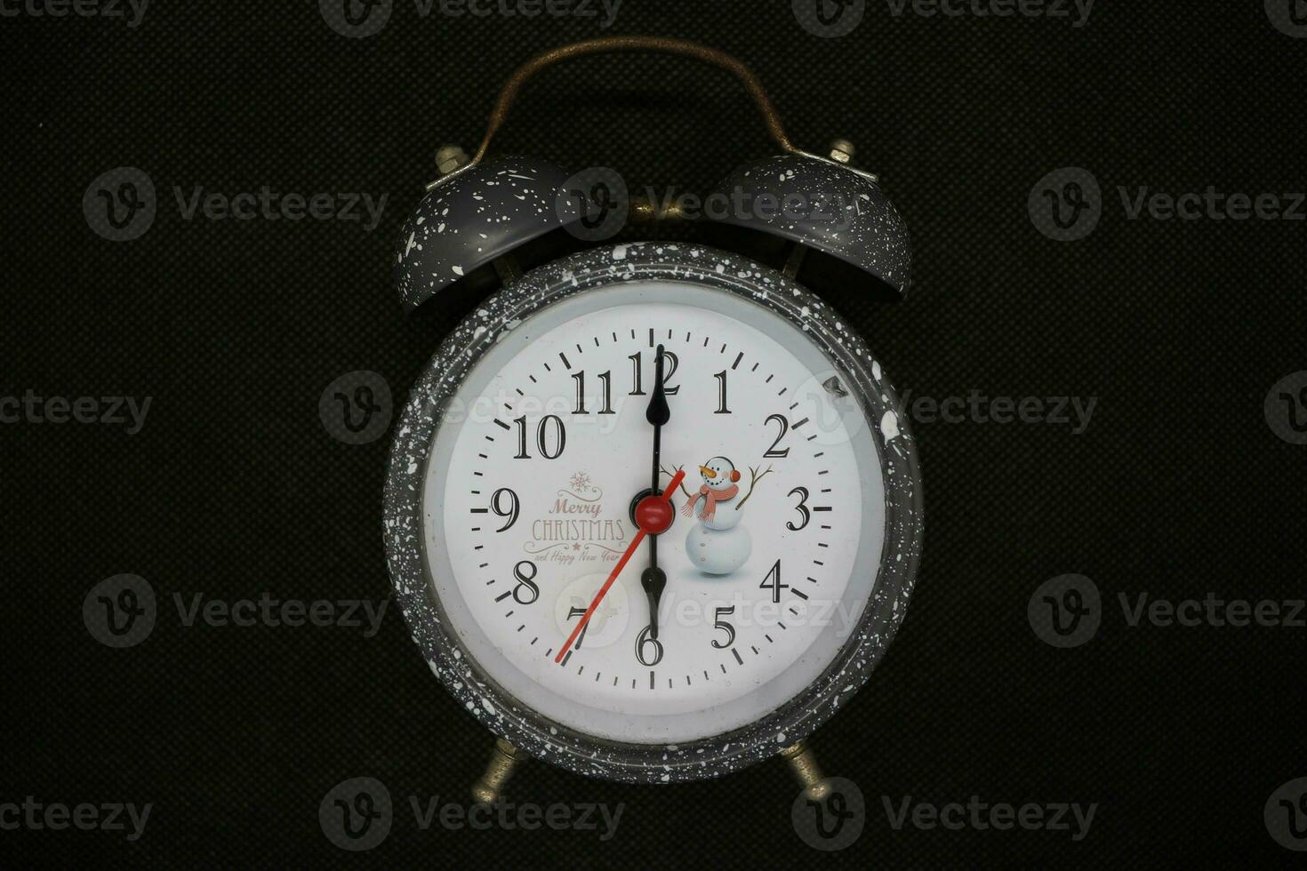 alarm clock with black background photo