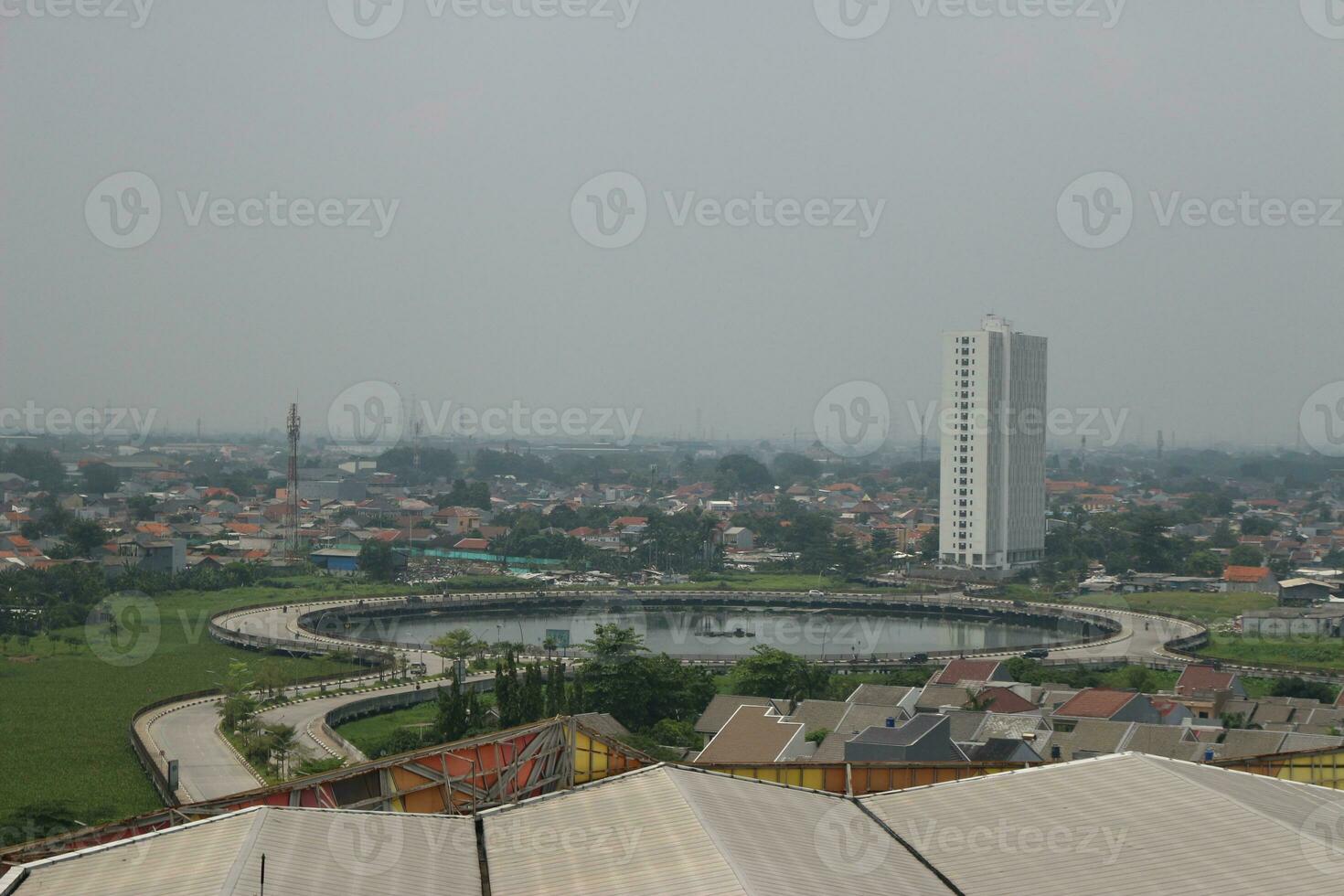 View of tall buildings, seen from the rooftop. photo