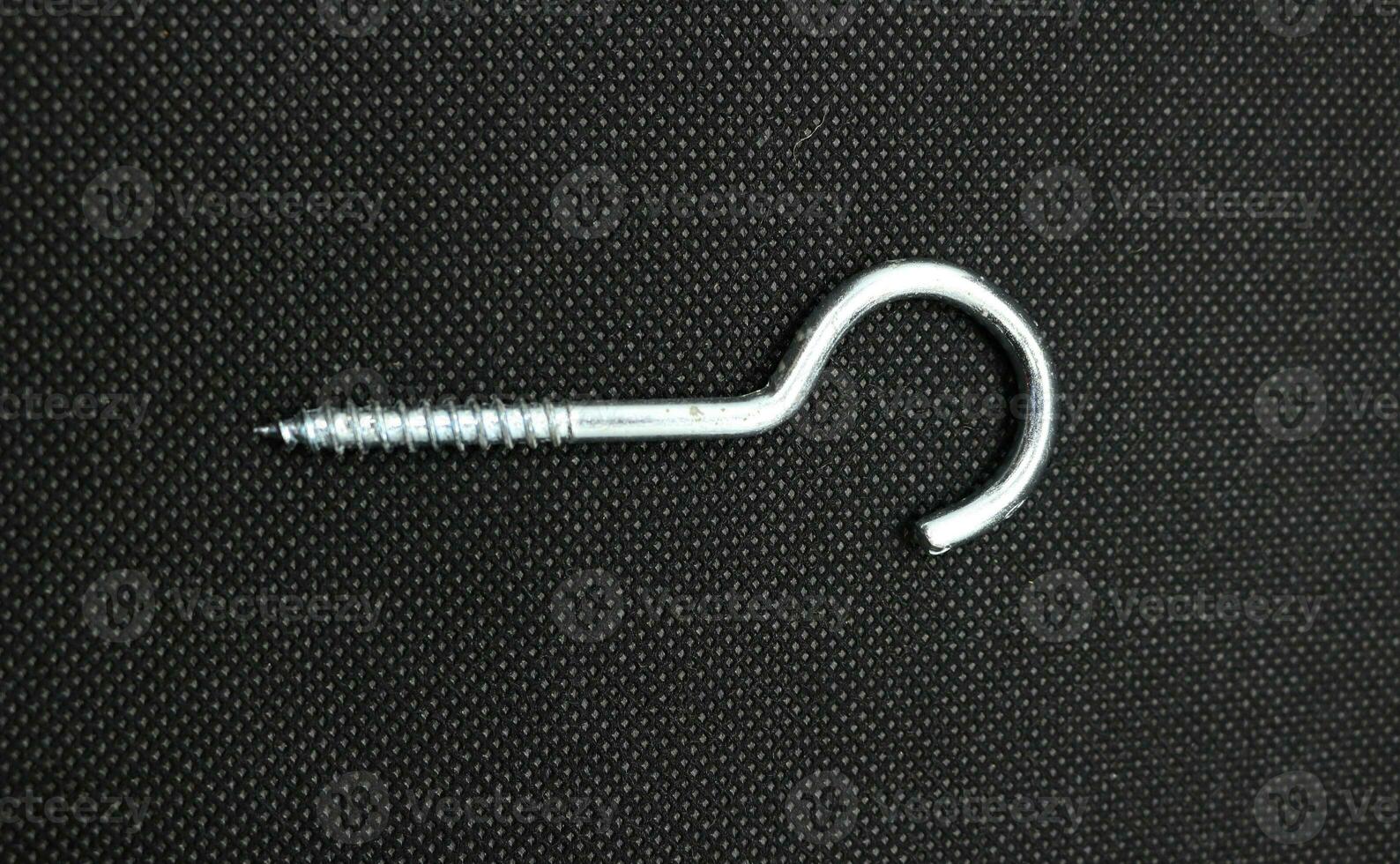 Hanger nails on a black background photo