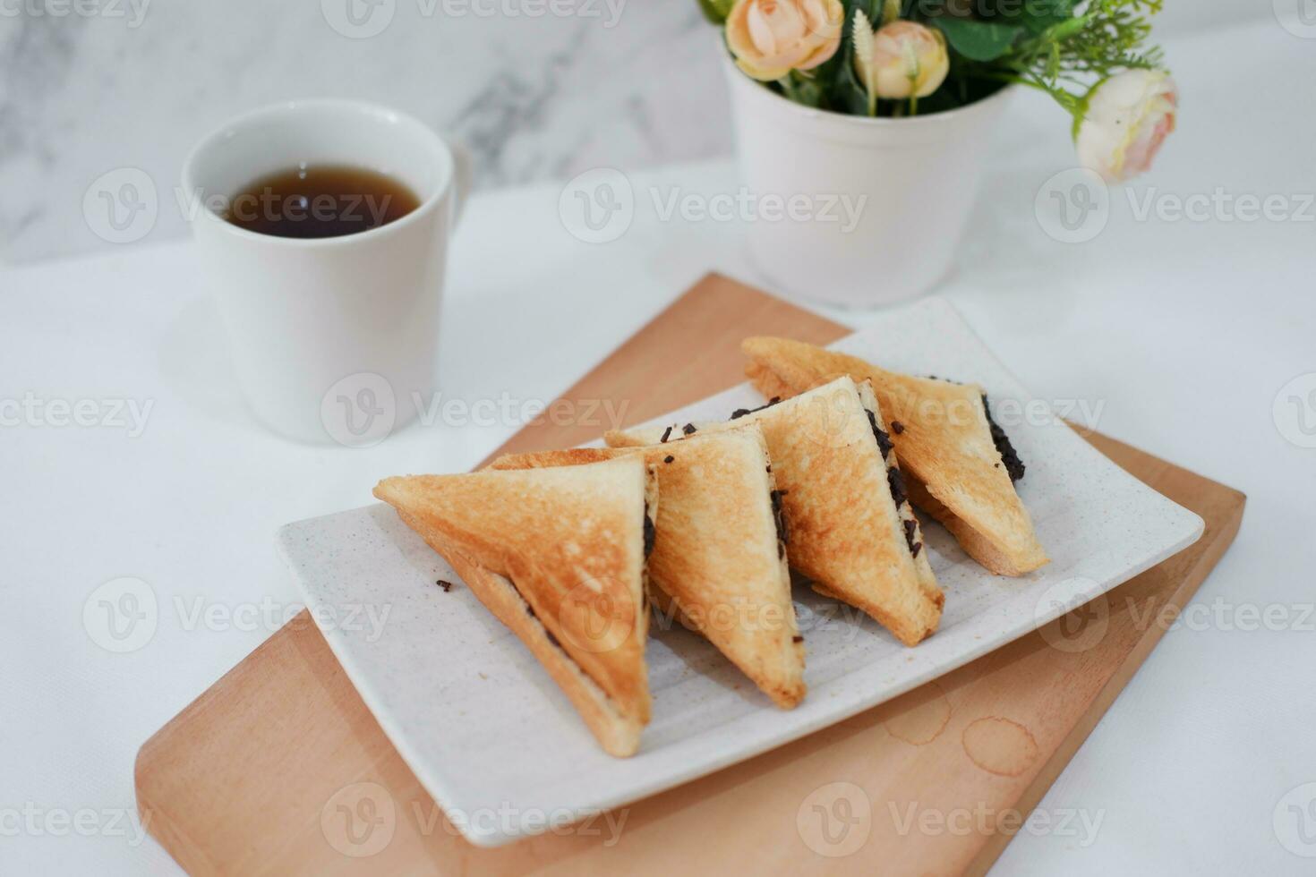 Coffee and toast on the table photo