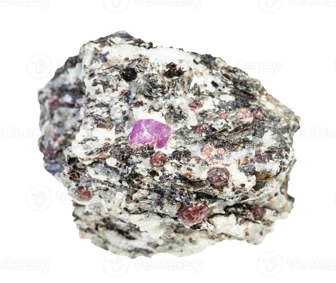ruby and corundum crystals in rough gneiss rock photo