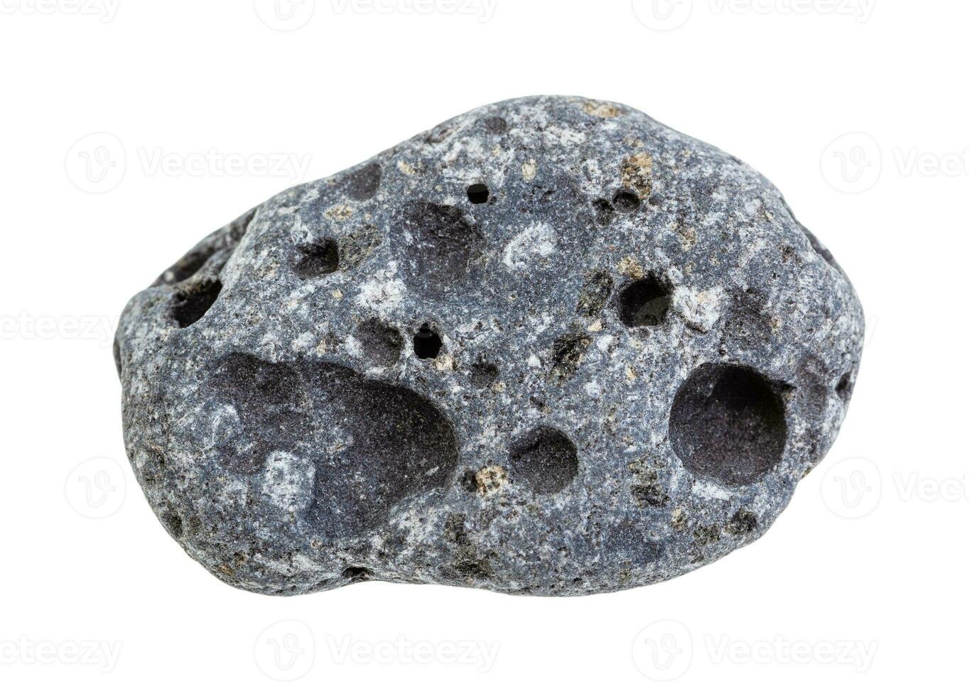 tumbled gray Pumice rock isolated on white photo